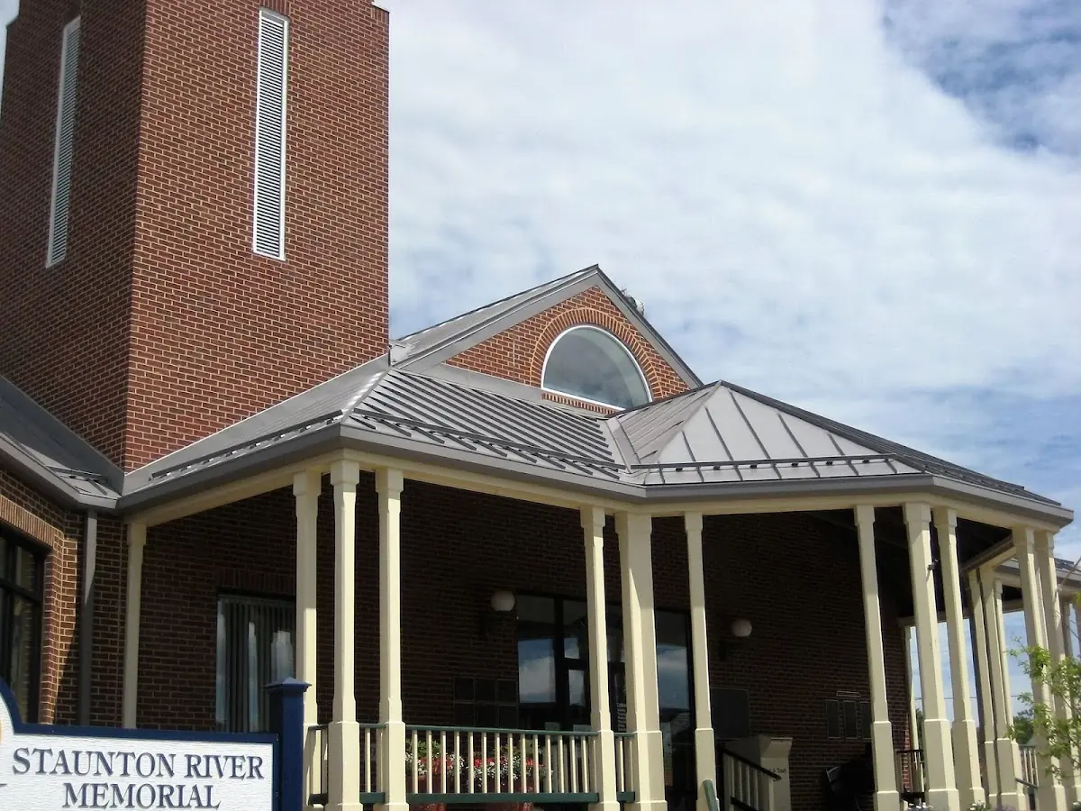 Skilled roofing craftsmen working on a residential roof in Johnson City